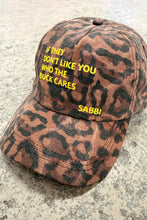 Load image into Gallery viewer, SABBI THE WHO THE BUCK CARES CAP